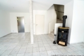 Schwedenofen beim Treppenaufgang - ***Brannenburg*** Geschmackvolle DHH mit Garten, Pool, Garage und guter Anbindung***