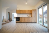 Offene Küche im Wohnraum mit neuer EBK - ***Neubau! Erstbezug! 2-Zimmer-DG-Wohnung mit neuer EBK und TG-Stellplatz in Alt-Happing!***