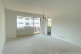 Das Wohnzimmer mit Blick zur Küche und zum Balkon - ***KOMPLETTRENOVIERUNG! 2-Zimmer-Wohnung mit Balkon und Stellplatz in RO/ Aisingerwies***